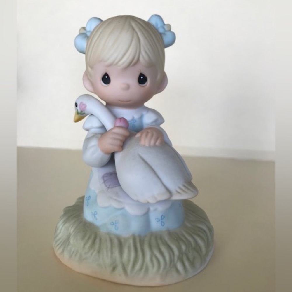 Precious Moments figurine, “God is Love”
